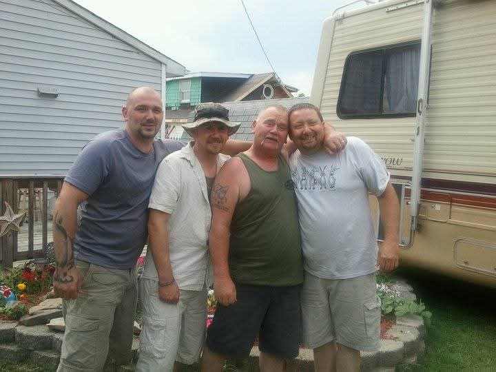 Four members of the Clark family standing together outdoors: from left, Joe Clark, Dan Clark Jr., Dan Clark Sr. and Joe Ball.